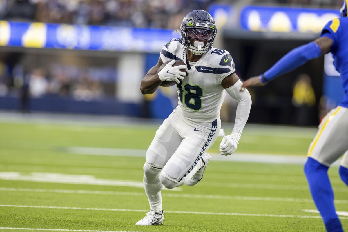 Seattle Seahawks wide receiver Laquon Treadwell catches a pass and runs against the Rams.
