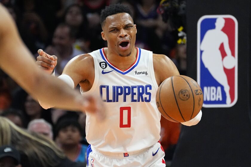 Los Angeles Clippers guard Russell Westbrook (0) movers the ball up court against the Phoenix Suns during Game 5 of a first-round NBA basketball playoff series, Tuesday, April 25, 2023, in Phoenix. (AP Photo/Matt York)