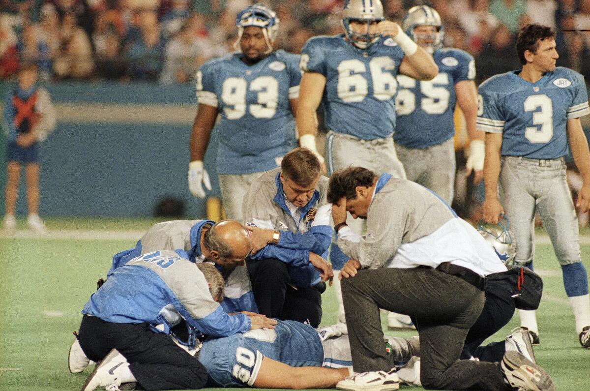 Detroit Lions offensive linesman Mike Utley is examined after suffering a spinal injury on Nov. 18, 1991.