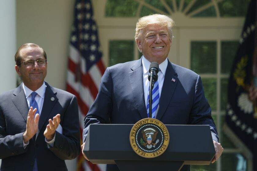 President Donald Trump pauses as he speaks during an event about prescription drug prices with Health and Human Services Secretary Alex Azar in the Rose Garden of the White House in Washington, Friday, May 11, 2018. (AP Photo/Carolyn Kaster)