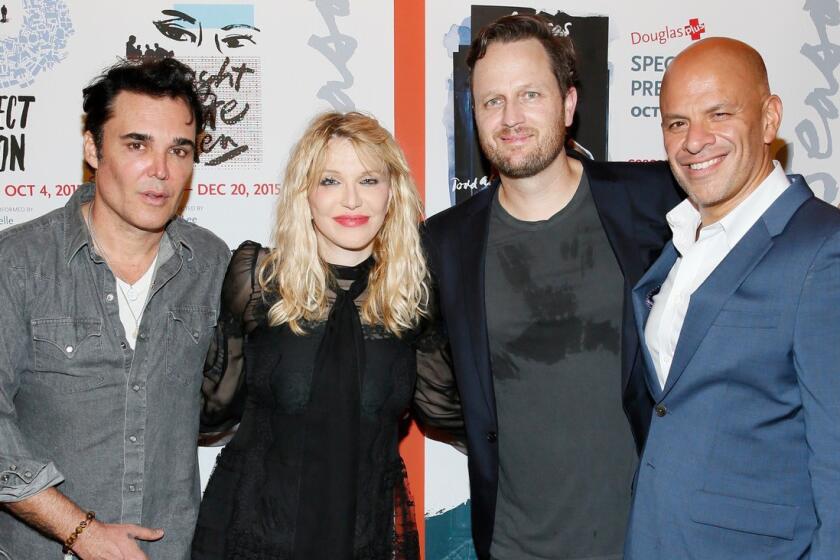 From left, photographer David LaChapelle, Courtney Love, Todd Almond and talent agent Mark Subias at the "Kansas City Choir Boy" after-party at Center Theatre Group's Kirk Douglas Theatre on Sunday.