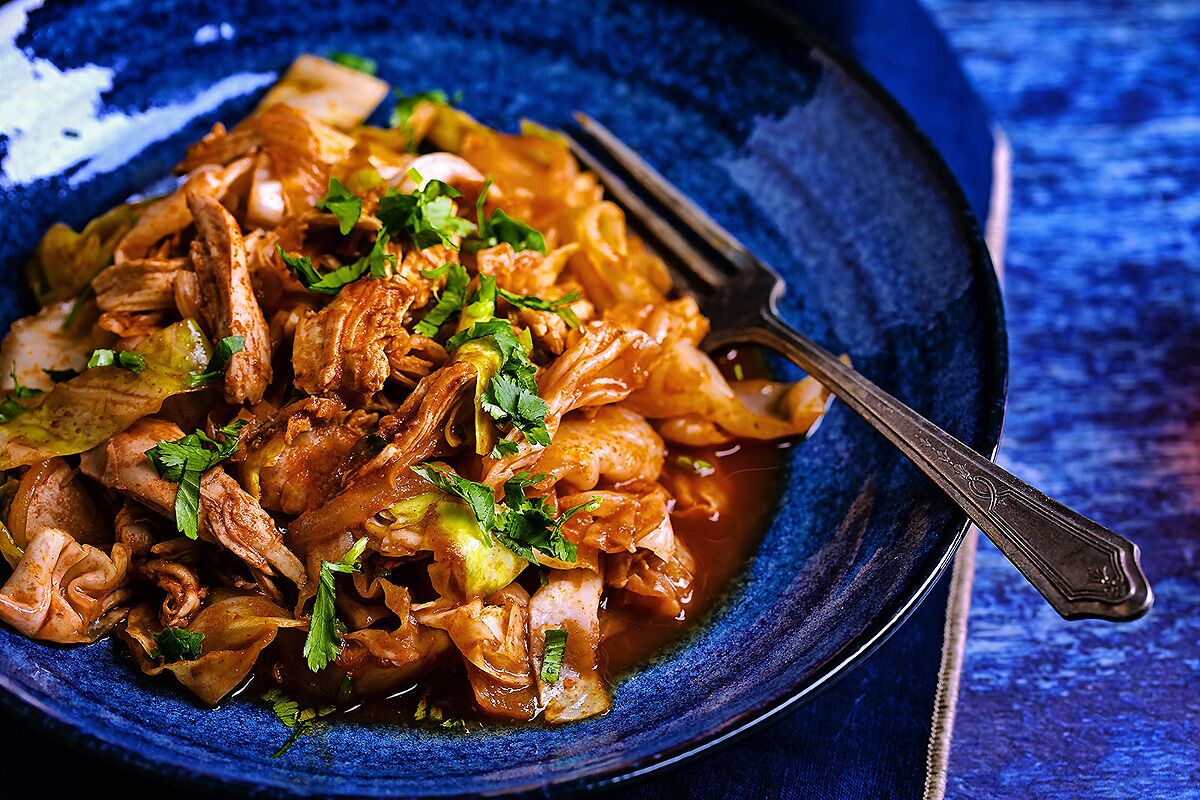 Sauteed Cabbage, Onions and Chicken With Paprika Tomato Sauce is a low-calorie, low-fat, one-pot meal.