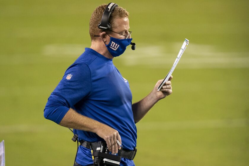 New York Giants offensive coordinator Jason Garrett looks on during the NFL football game.