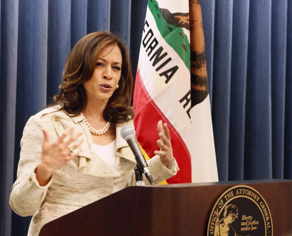 California Atty. Gen. Kamala Harris, shown in a file photo, announced the arrest of two state workers and a contractor in a bribery and fraud case.
