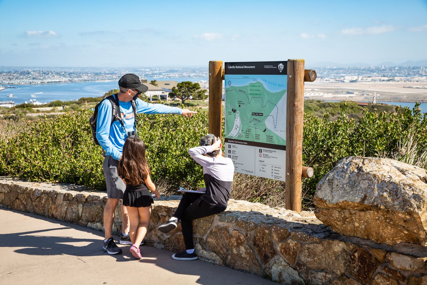 Adam Riffe with daughter Tiffany and son Zachary check out a map at Cabrillo National Monument.