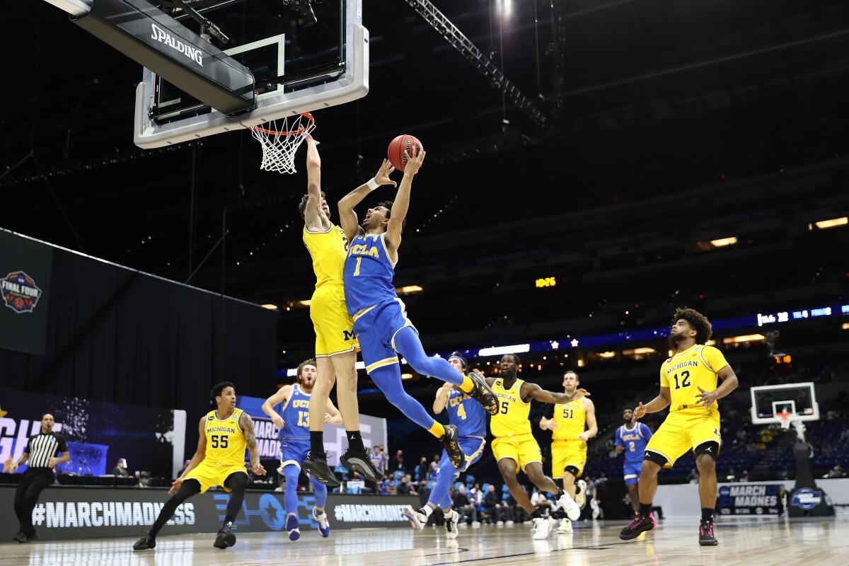 Jules Bernard of UCLA drives to the basket