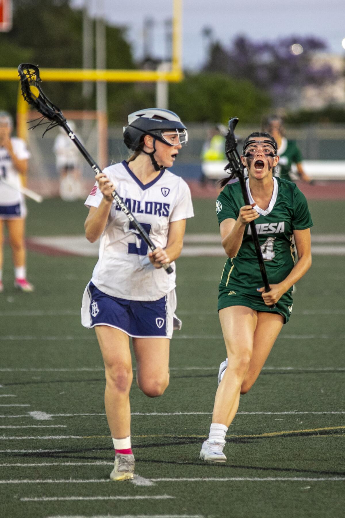 Murrieta Mesa's Jayda Johnson closes in on Newport Harbor's Rowdy Farmer.