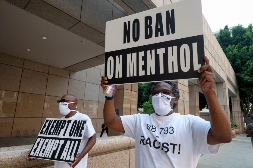 2CCBAAF Los Angeles, California, USA. 20th Aug, 2020. Criminal justice reform, homeless, drug and recovery and civil rights advocates take part in a march and rally to voice their opposition to SB 793, which they say is ''anti-Black and unfairly targets African Americans with a ban on the sale of flavored tobacco statewide - specifically menthol cigarettes.'' According to contact, 88% of Black adults who smoke prefer menthol-flavored tobacco products, and a ban would turn Black menthol-flavored cigarette smokers into ''criminals.'' outside the Ronald Reagan State Building. (Credit Image:  Ringo Chiu