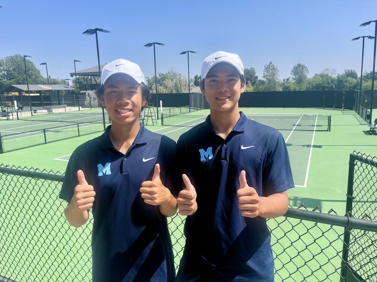 Marina High boys' tennis sophomore David Tran, left, and junior Trevor Nguyen.