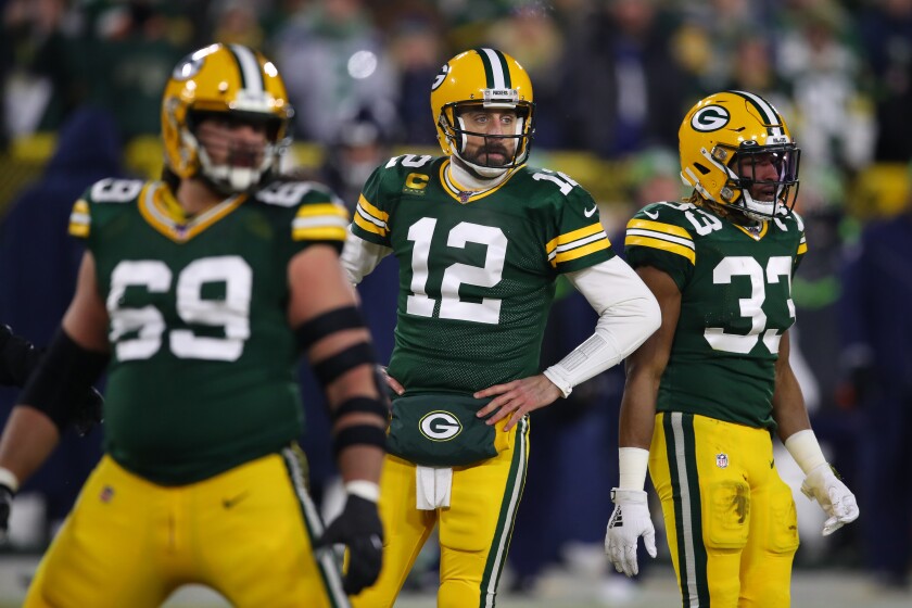Packers quarterback Aaron Rodgers looks on during a game against the Seahawks on Jan. 12 in an NFC divisoinal playoff game at Lambeau Field.