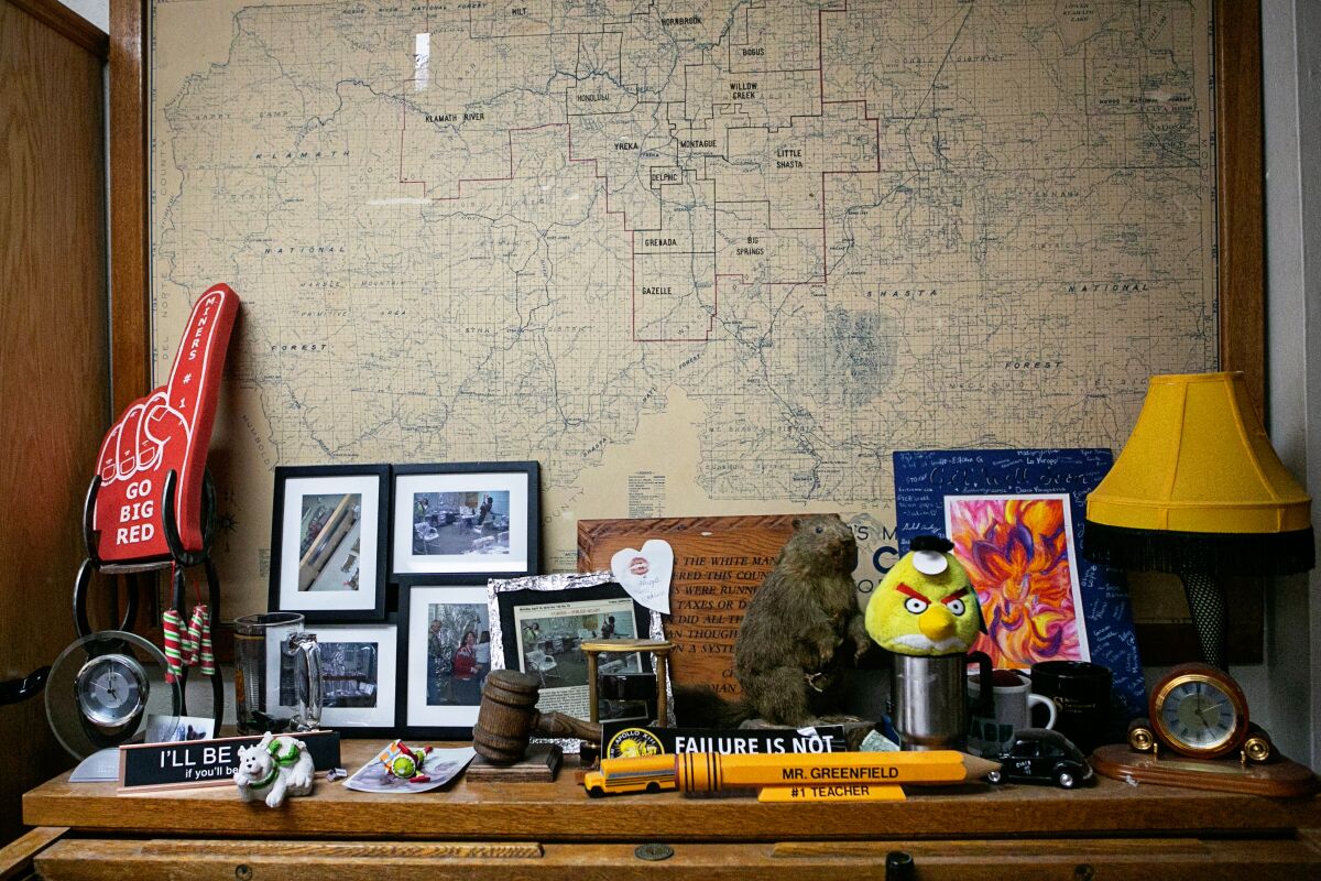 A map of the Yreka Union High School District hangs above a table.