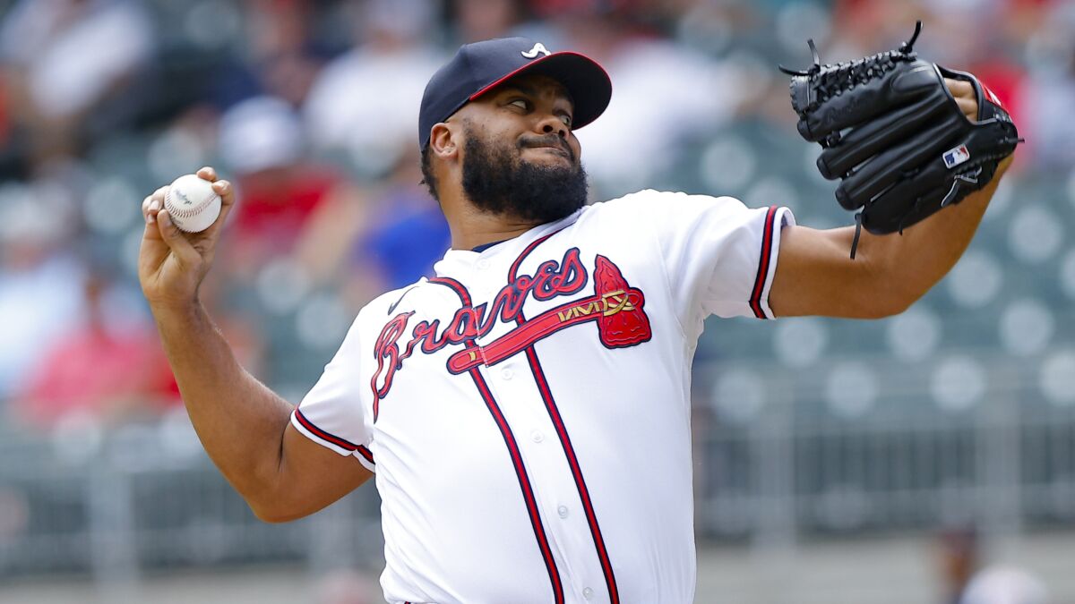 FILE - Atlanta Braves relief pitcher Kenley Jansen delivers in the ninth inning of a baseball game against the San Francisco Giants, Thursday, June 23, 2022, in Atlanta. Veteran reliever Kenley Jansen has agreed to a $32 million, two-year deal with the Boston Red Sox, a person familiar with the deal told The Associated Press. The person spoke to the AP on condition of anonymity Wednesday, Dec. 8, because the agreement was pending a physical. (AP Photo/Todd Kirkland, File)