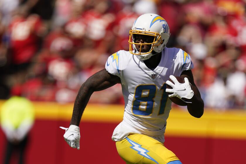 Los Angeles Chargers' Mike Williams (81) runs during the first half of an NFL football game against the Kansas City Chiefs, Sunday, Sept. 26, 2021, in Kansas City, Mo. (AP Photo/Charlie Riedel)