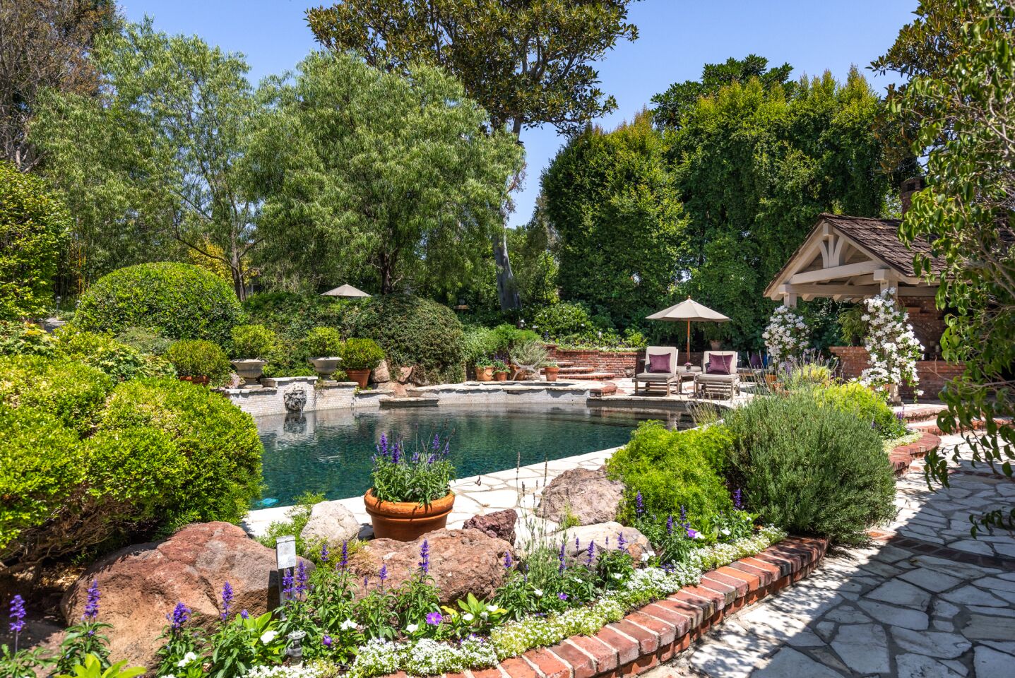 The grounds feature a lagoon-style swimming pool.