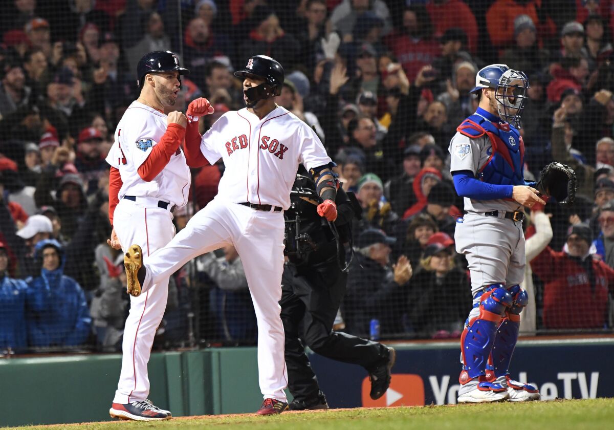 Boston's Eduardo Nunez celebrates after hitting a three-run home run.