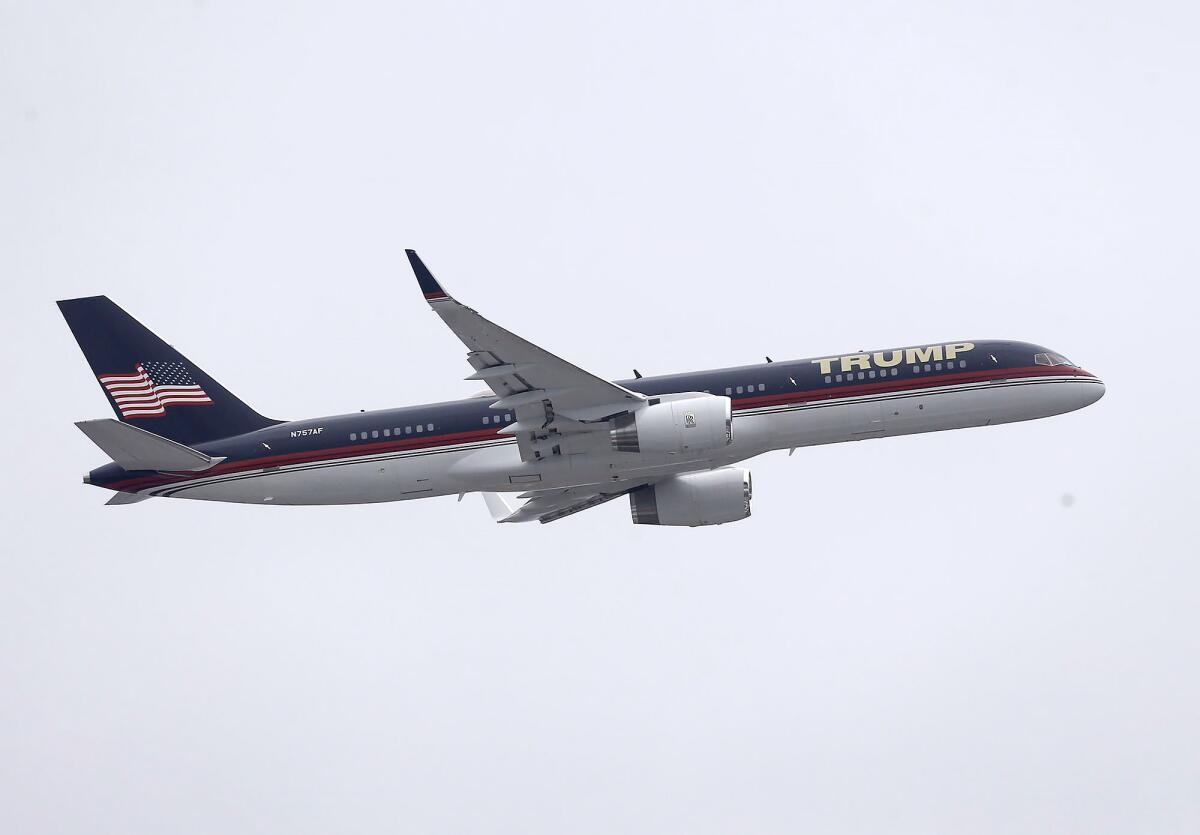 Former President Donald Trump's Boeing 757 does a fly-over to a rally in Anaheim on Friday.