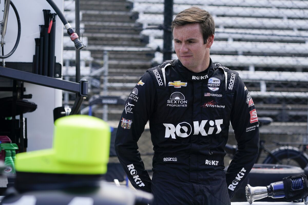 Kyle Kirkwood looks at his car during practice for the Indianapolis 500 auto race at Indianapolis Motor Speedway, Thursday, May 19, 2022, in Indianapolis. (AP Photo/Darron Cummings)