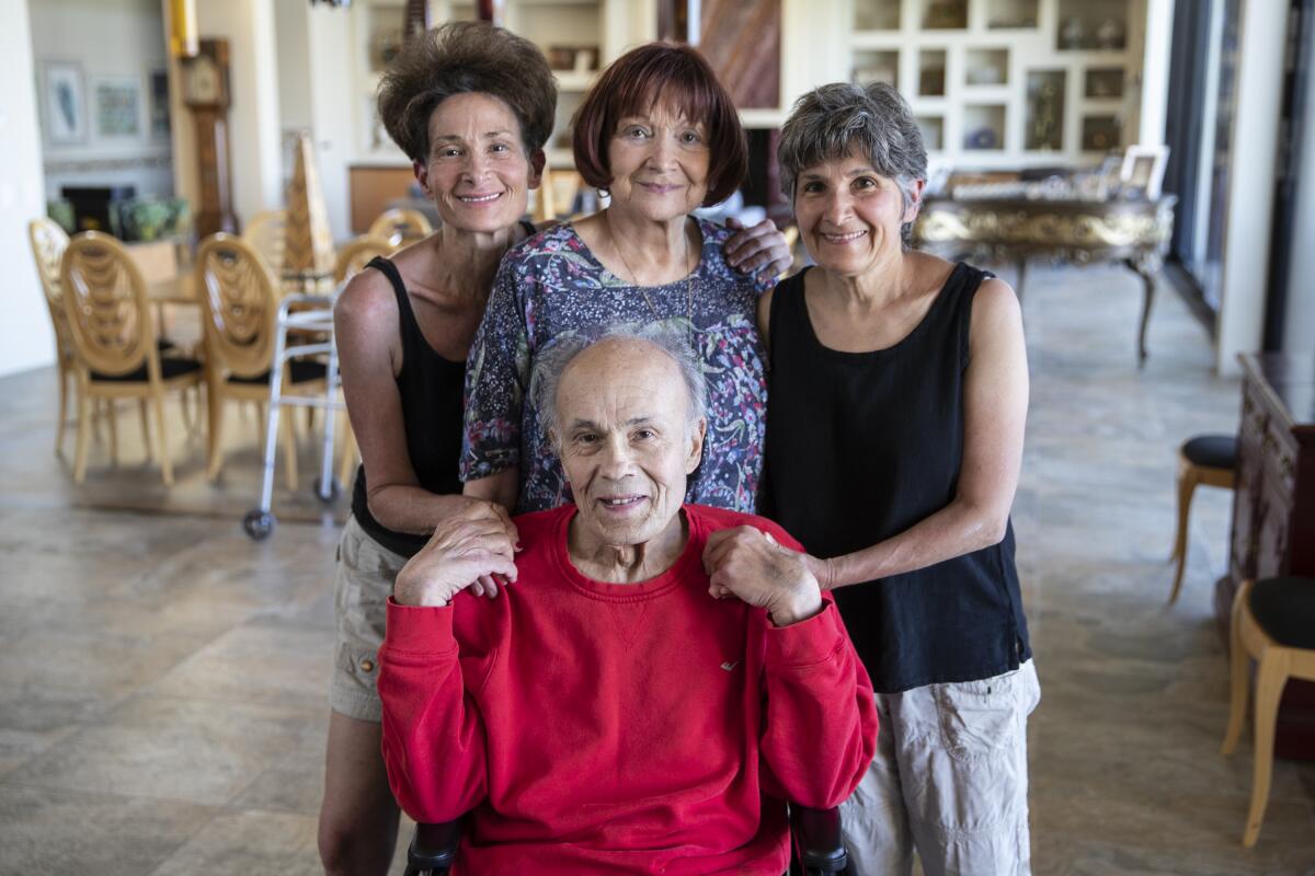 Robert and Sandra Borns, center, with daughters, Betsy Borns, left, and Stephanie Borns-Weil