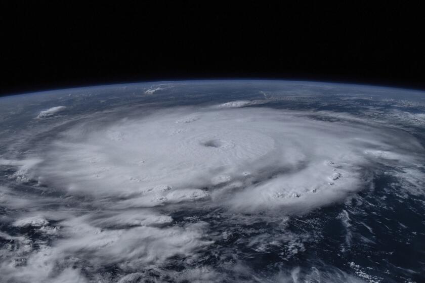 This image provided by NASA shows Hurricane Beryl from the International Space Station on Sunday, July 1, 2024. Beryl was roaring toward Jamaica on Wednesday, July 3, with islanders scrambling to make preparations after the powerful Category 4 storm earlier killed at least six people and caused significant damage in the southeast Caribbean. (NASA via AP)