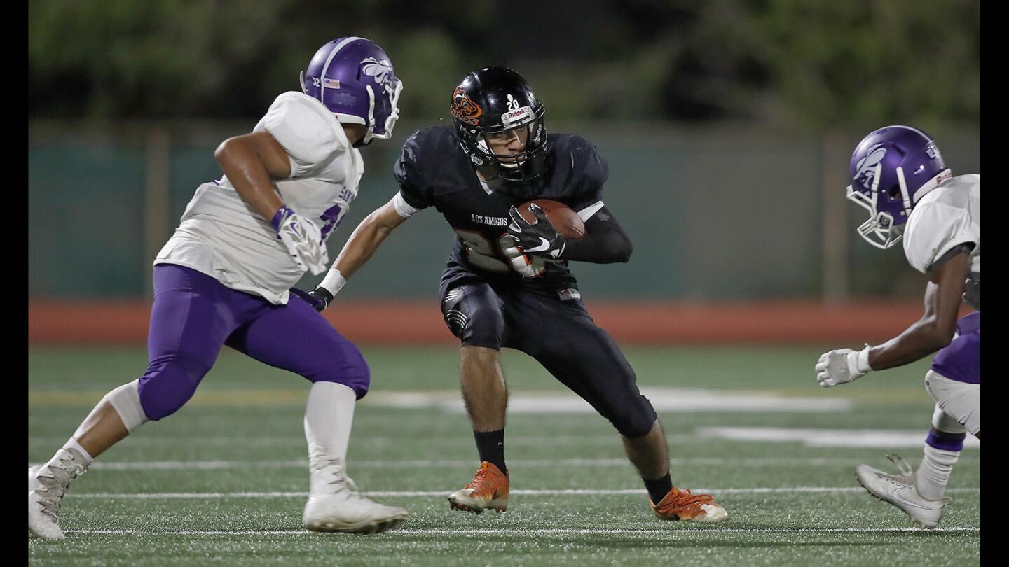 Photo Gallery: Los Amigos High vs. Santiago football game