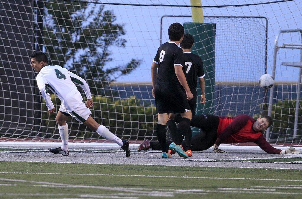 Sage Hill School's Dakshin Jandhyala (4) scores a goal during the first half against Brethren Christian in an Academy League game on Thursday.