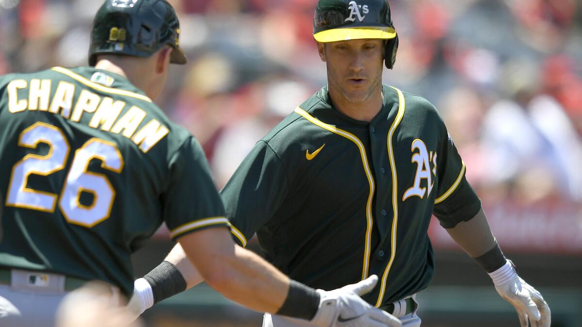 Newcomers Gomes, Marte boost Jefferies, A's over Angels 8-3