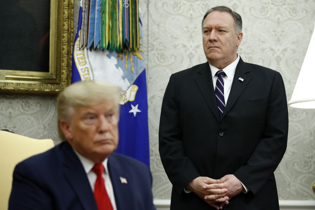 Secretary of State Michael R. Pompeo, right, and President Trump.