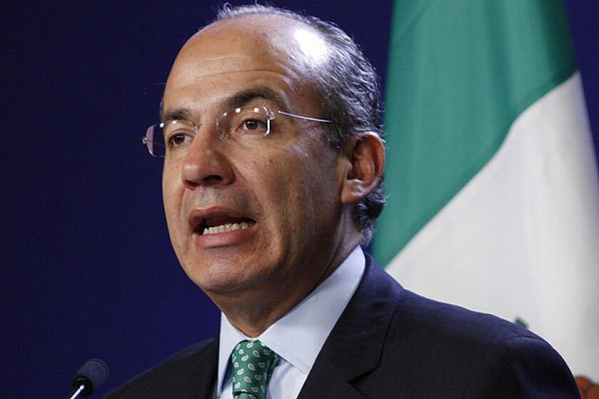 Mexico's President Felipe Calderon speaks during a news conference.