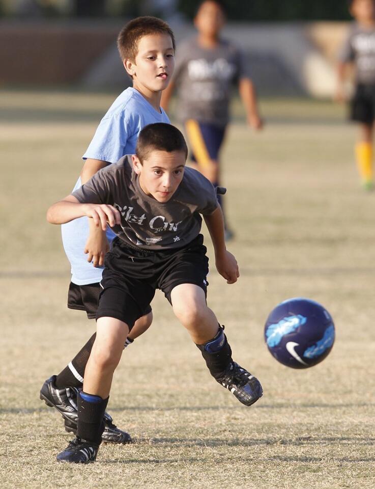 California's Carter Gruebel boots the ball upfield during a boys' 3-4 silver division game Friday.