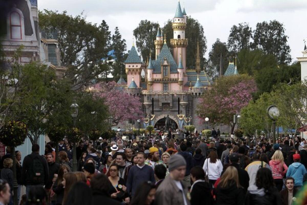 Visitors at the Magic Kingdom at Disneyland.