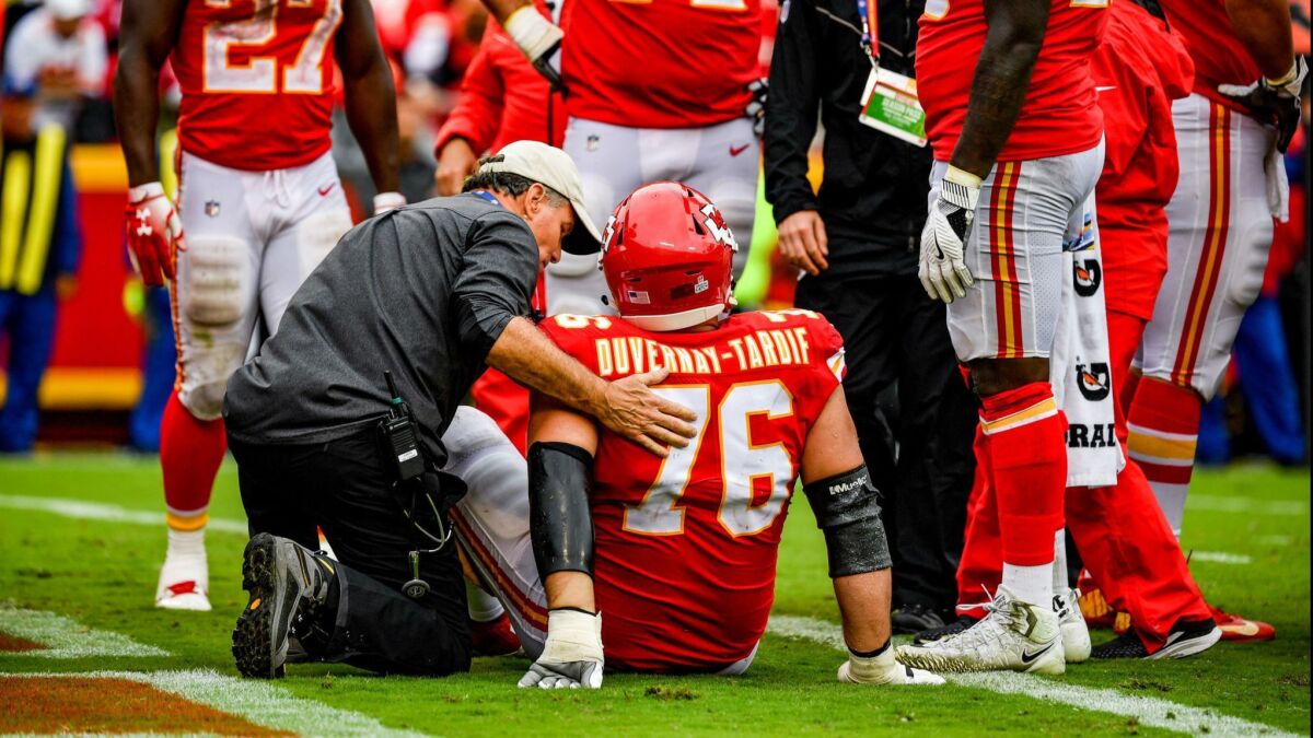 Laurent Duvernay-Tardif of the Chiefs is injured on a play against the Jaguars.