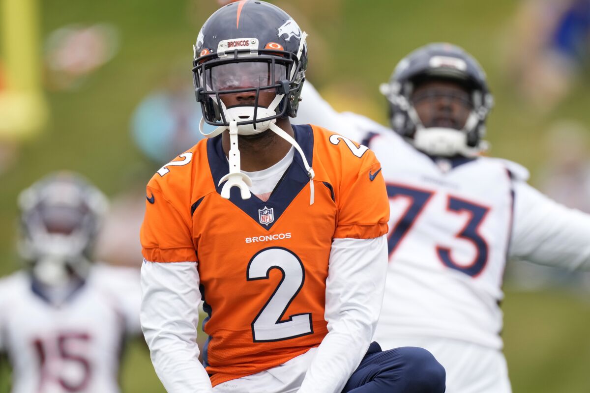 FILE - In this Aug. 19, 2021, file photo, Denver Broncos cornerback Pat Surtain II takes part in drills during an NFL football training camp at the team's headquarters in Englewood, Colo. Surtain II's first NFL start comes against a familiar foe: Jaguars rookie QB Trevor Lawrence, whose Clemson Tigers walloped his top-ranked Alabama Crimson Tide in the national championship three years ago. (AP Photo/David Zalubowski, File)