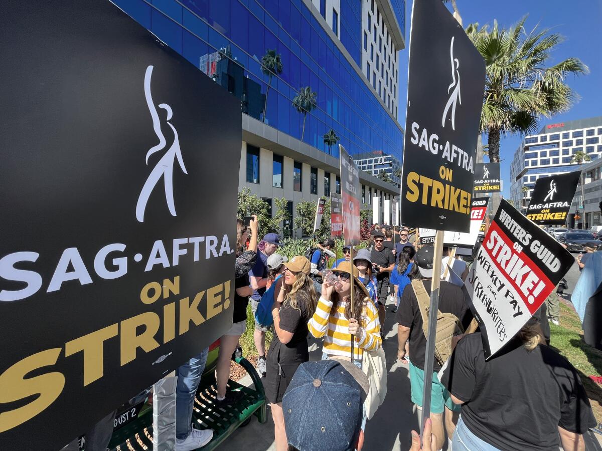 SAG-AFTRA members take to the picket line outside Netflix in Los Angeles on July 14, 2023. 