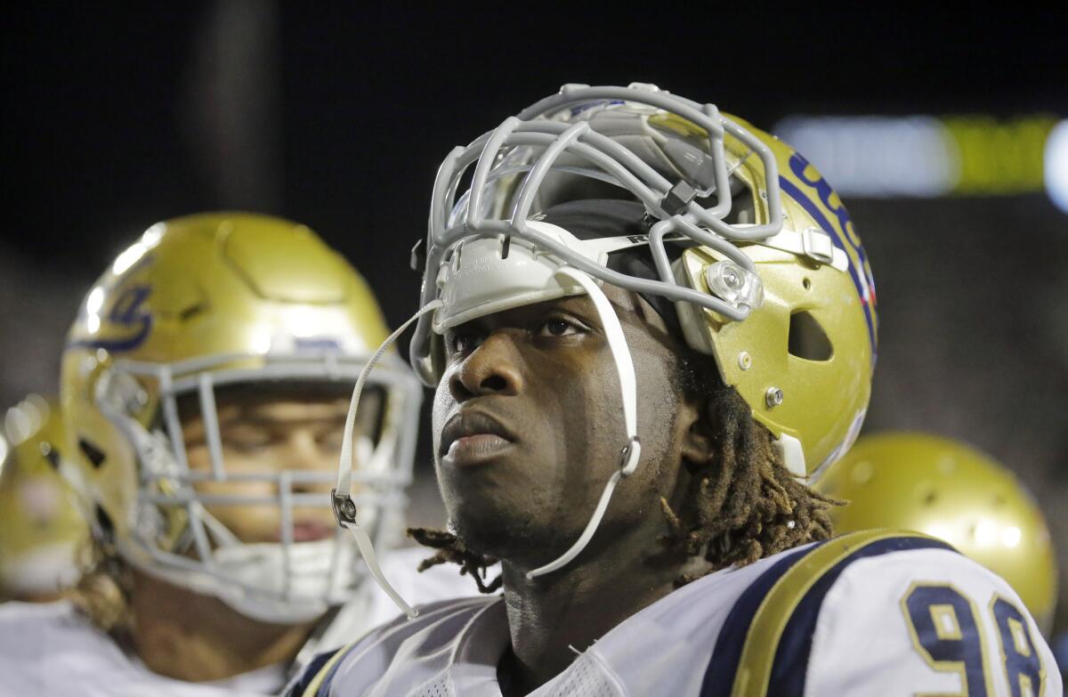 UCLA defensive lineman Takkarist McKinley has received recognition for forcing a fumble. (Rick Bowmer / Associated Press)