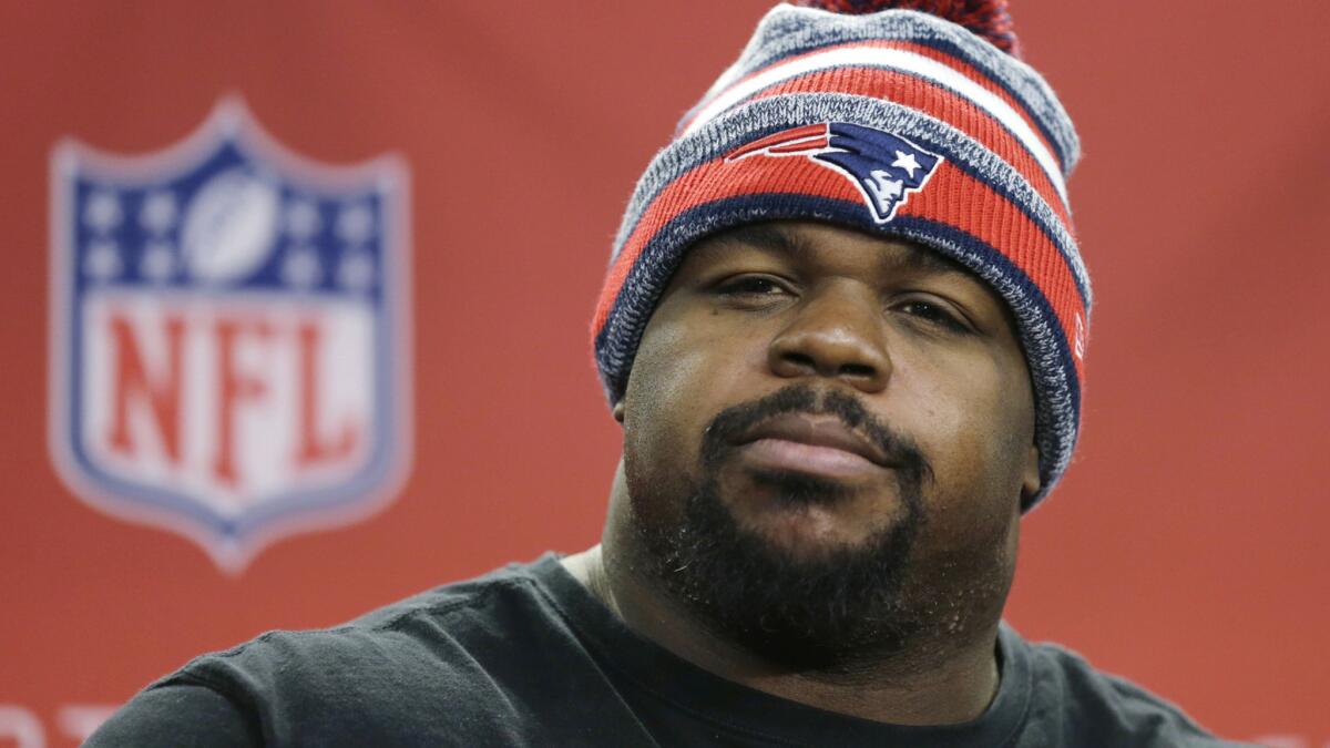 New England Patriots defensive tackle Vince Wilfork speaks at a news conference on Jan. 14. Wilfork announced Monday that he is joining the Houston Texans.