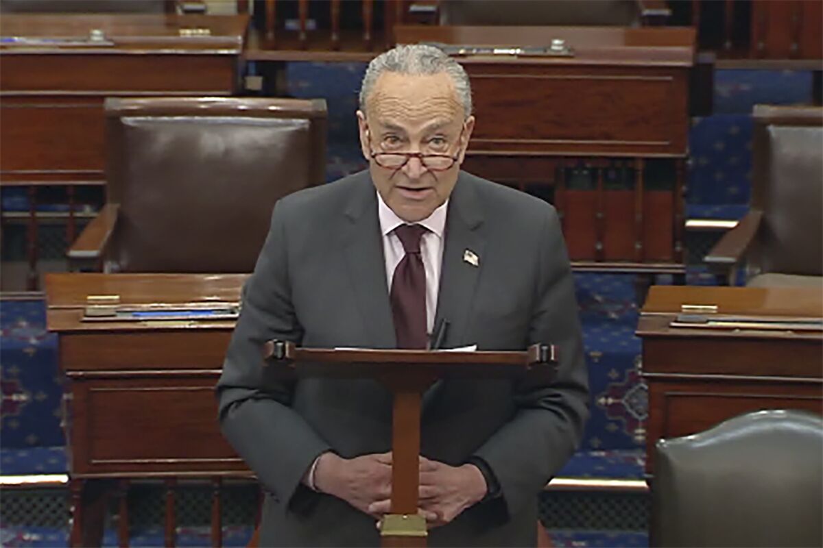 In this image from Senate TV, Senate Majority Leader Chuck Schumer of N.Y., speaks on the Senate floor, Tuesday, May 3, 2022 at the Capitol in Washington. A draft opinion suggests the U.S. Supreme Court could be poised to overturn the landmark 1973 Roe v. Wade case that legalized abortion nationwide, according to a Politico report. “This is as urgent and real as it gets,” Schumer said on the Senate floor Tuesday. “Every American is going to see on which side every senator stands.” (Senate TV via AP)