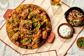 LOS ANGELES, CA - NOVEMBER 10, 2022: Chicken and rice tagine prepared by cooking columnist Ben Mims on November 10, 2022 in the LA Times test kitchen. (Katrina Frederick for the Los Angeles Times)