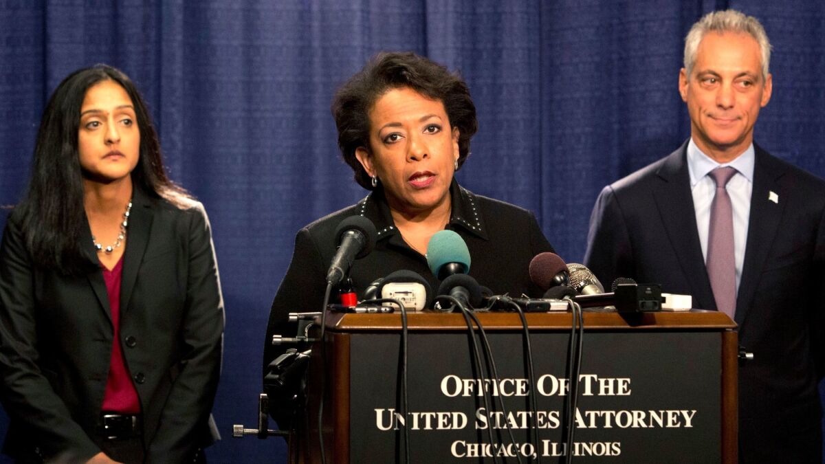 Attorney General Loretta Lynch is accompanied by Principal Deputy Assistant Attorney General Vanita Gupta, left, and Chicago Mayor Rahm Emanuel at a news conference in Chicago on Jan. 13.