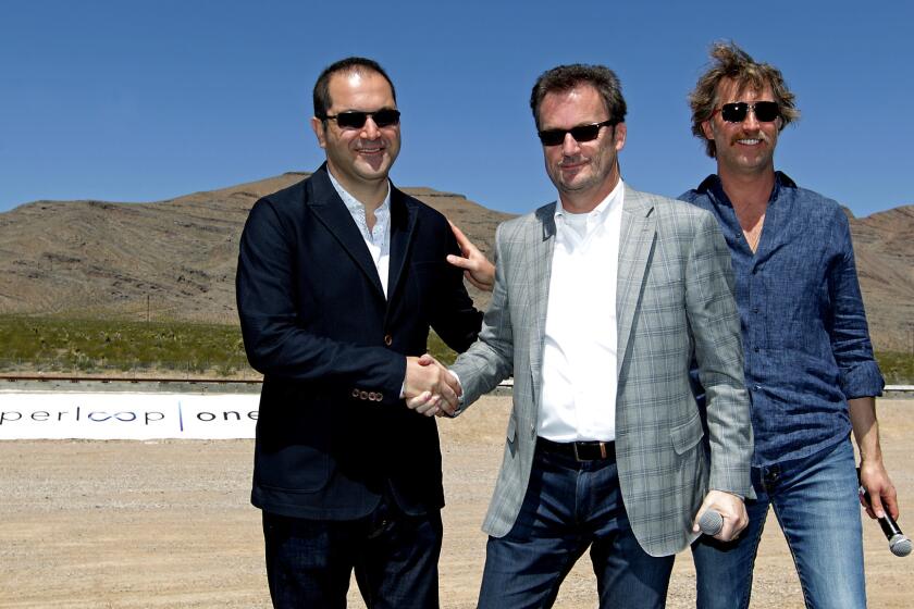 Hyperloop One Executive Chairman Shervin Pishevar, left, Chief Executive Rob Lloyd and then-Chief Technology Officer Brogan BamBrogan attend a company event in May.