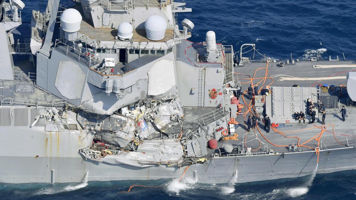 The damage of the right side of the USS Fitzgerald is seen off Shimoda, Shizuoka prefecture, Japan, after the Navy destroyer collided with a merchant ship, Saturday, June 16, 2017. The U.S. Navy says the USS Fitzgerald suffered damage below the water line on its starboard side after it collided with a Philippine-flagged merchant ship. (Iori Sagisawa/Kyodo News via AP)