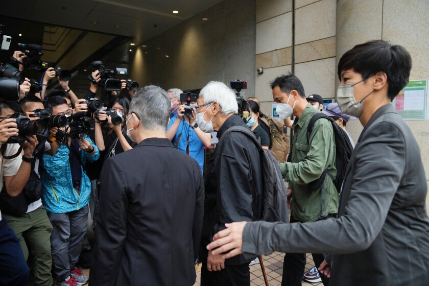 Group of defendants arriving at courthouse in Hong Kong