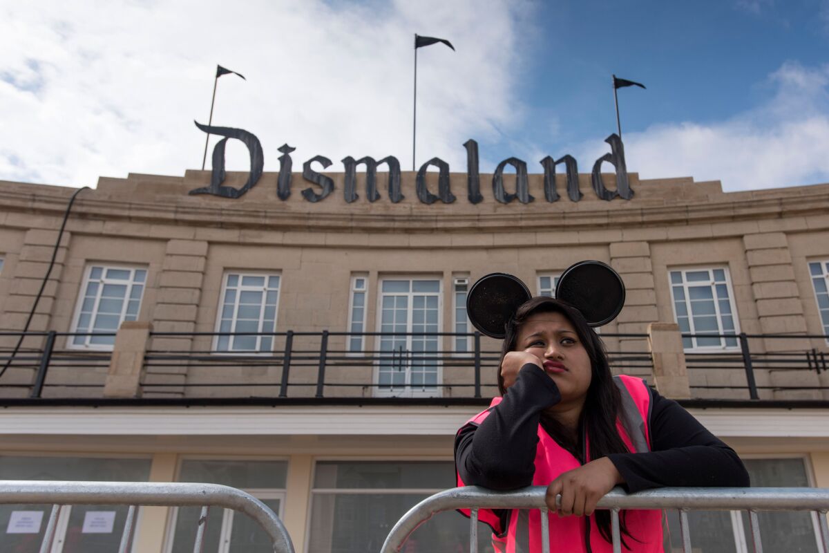 Bansky's 'Dismaland' exhibition, which opened at a derelict seafront park in Weston-Super-Mare, England, last week, takes on the form of a theme park gone seriously awry.