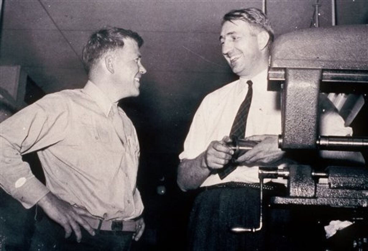 FILE - This is an undated photo from the 1940's of William Hewlett, left, and David Packard, who co-founded Silicon Valley electronics company Hewlett-Packard Co. in 1938, running it out of their Palo Alto, Calif., garage at the end of the Great Depression. (AP Photo/HO/Hewlett Packard, File)