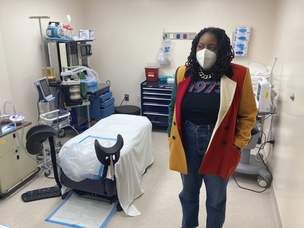 Executive Director of Feminist Women's Health Center Kwajelyn Jackson stands in an operation room a day after a federal court allowed Georgia's abortion ban to go into effect immediately, Thursday, July 21, 2022, in Brookhaven, Ga. (AP Photo/Sharon Johnson)