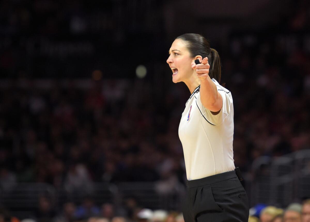 NBA referee Lauren Holtkamp gestures during a January game between the Clippers and the Heat.