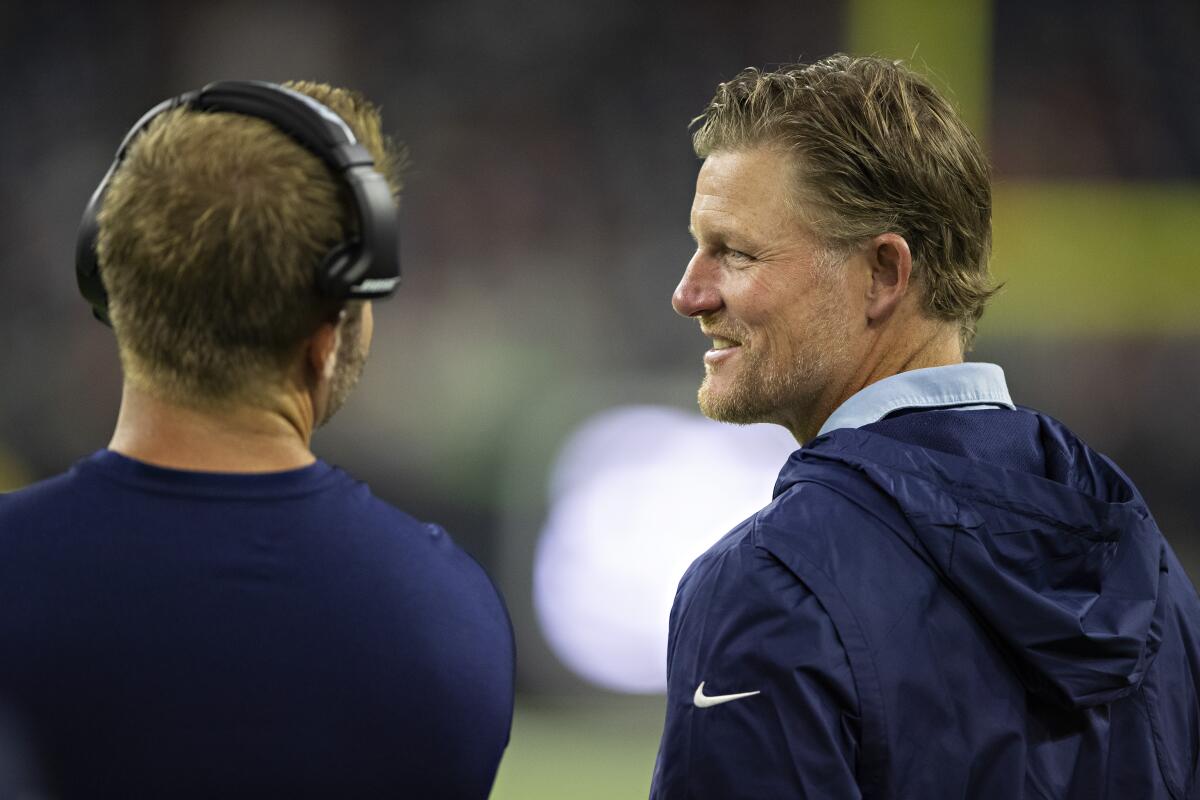 Rams general manager Les Snead, right, speaks with coach Sean McVay during the Rams' 22-10 preseason victory over the Houston Texans on Thursday.