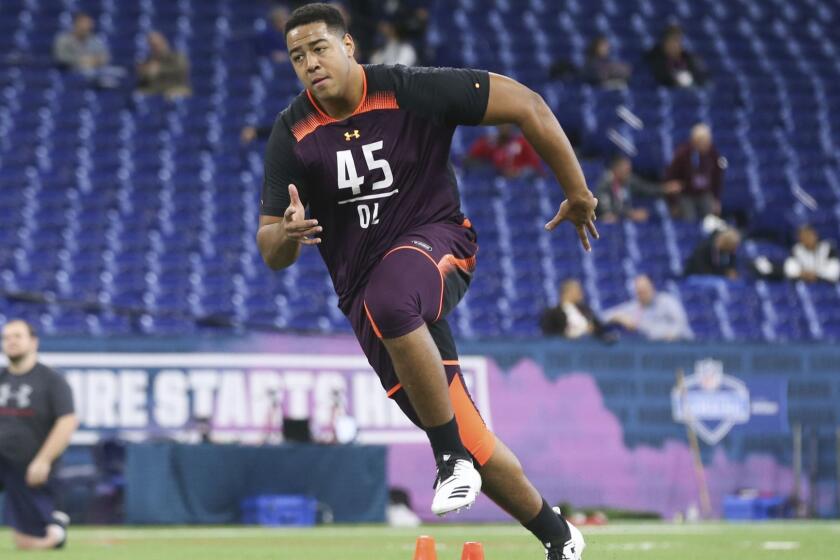 Sioux Falls offensive lineman Trey Pipkins runs a drill during the 2019 Scouting Combine in Indianapolis on Friday, March. 1, 2019. (Perry Knotts via AP)