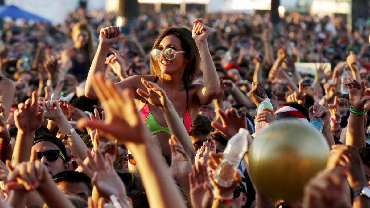 Fans watch a performance at the Hard Summer music festival at the Fairplex in 2015. A proposal would add a $5 charge on new music events to help mitigate noise, traffic and trash that result from events at the Fairplex.