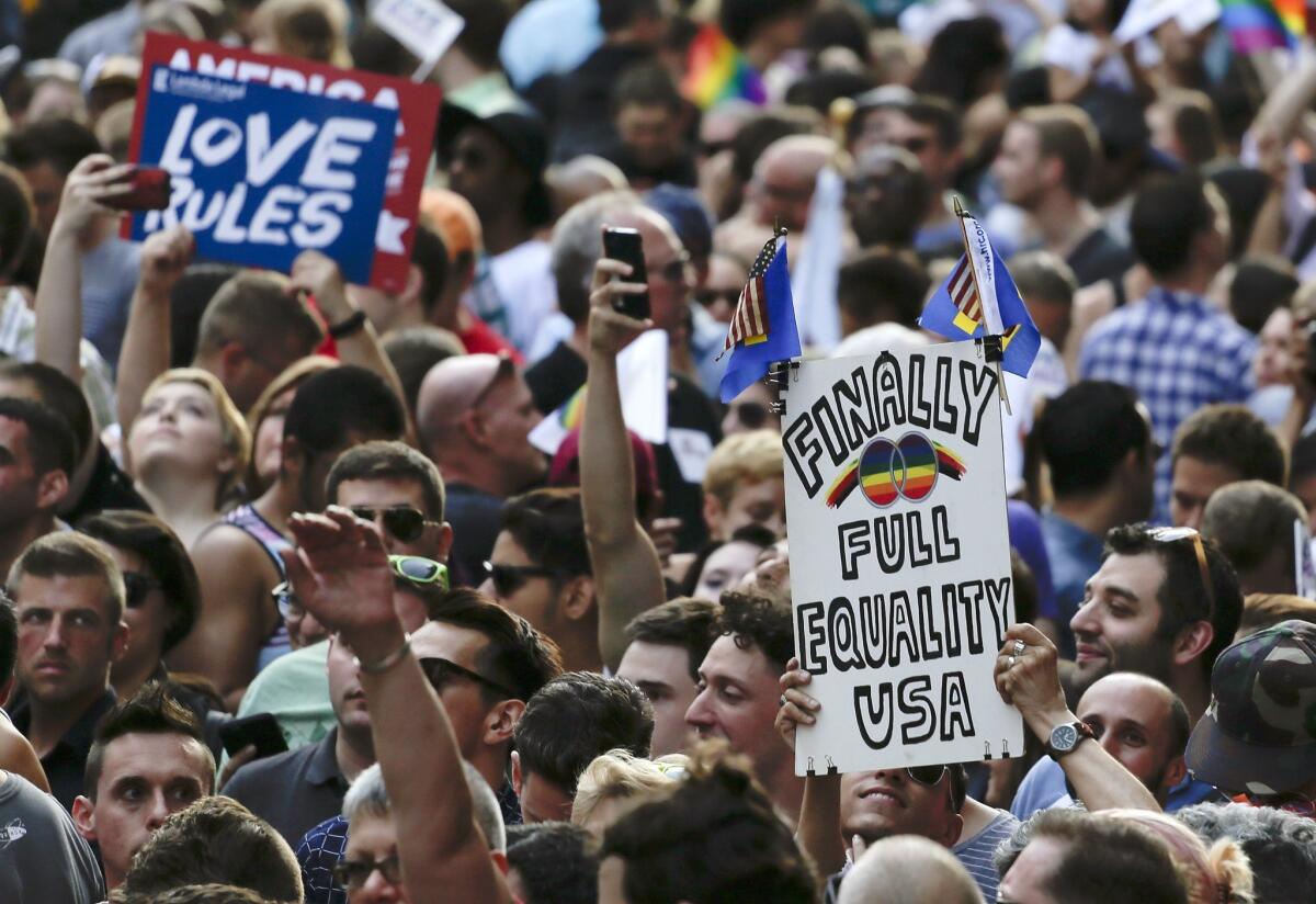 Demonstrators gather at a rally in Greenwich Village on Friday, June 26 in New York to celebrate the Supreme Court's ruling on gay marriage.