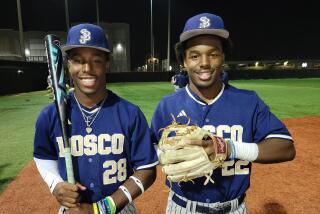St. John Bosco's Clark twins, Miles (left) and James.